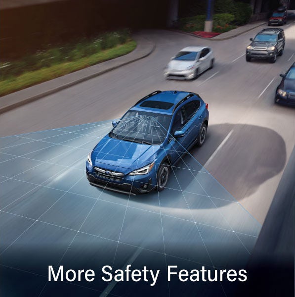 A Subaru Crosstrek in blue with the words &ldquo;More Safety Features&ldquo;. | Mid-Hudson Subaru in Wappingers Falls NY