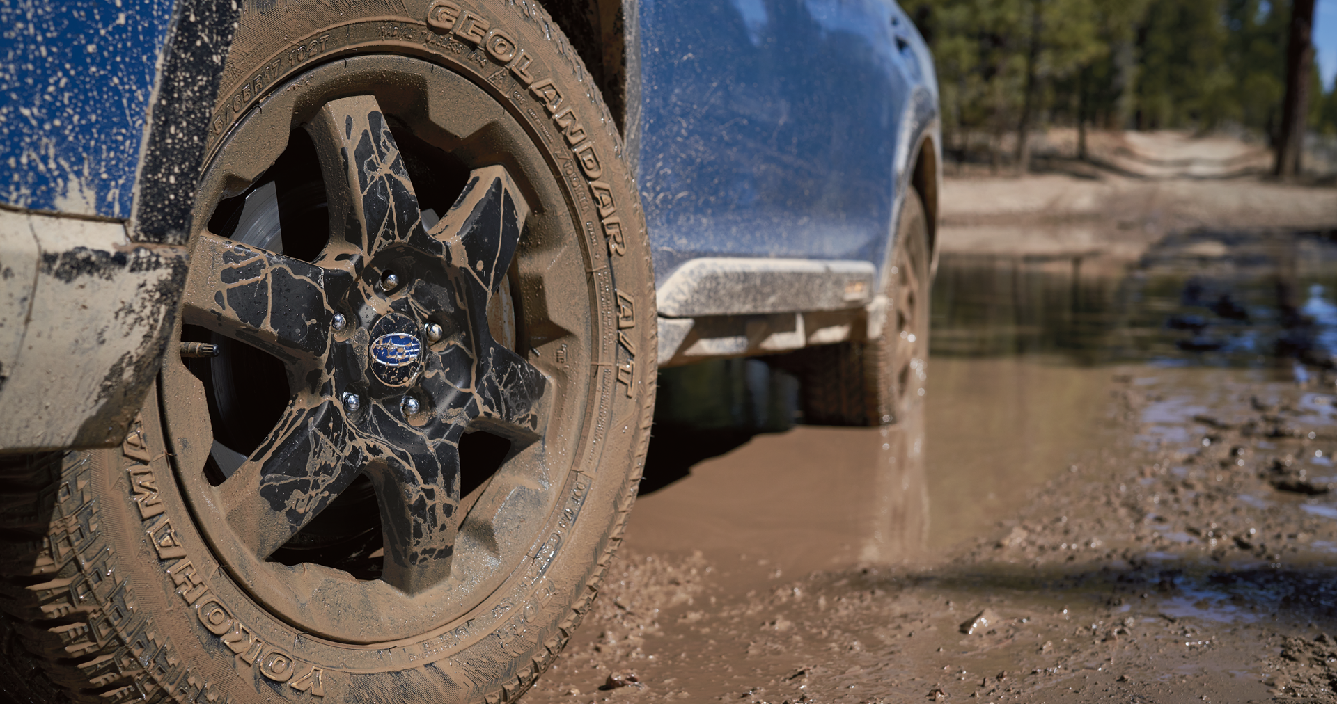 A close-up of the 17-inch off-road wheels and all-terrain Yokohama GEOLANDAR® tires on the 2023 Outback Wilderness. | Mid-Hudson Subaru in Wappingers Falls NY